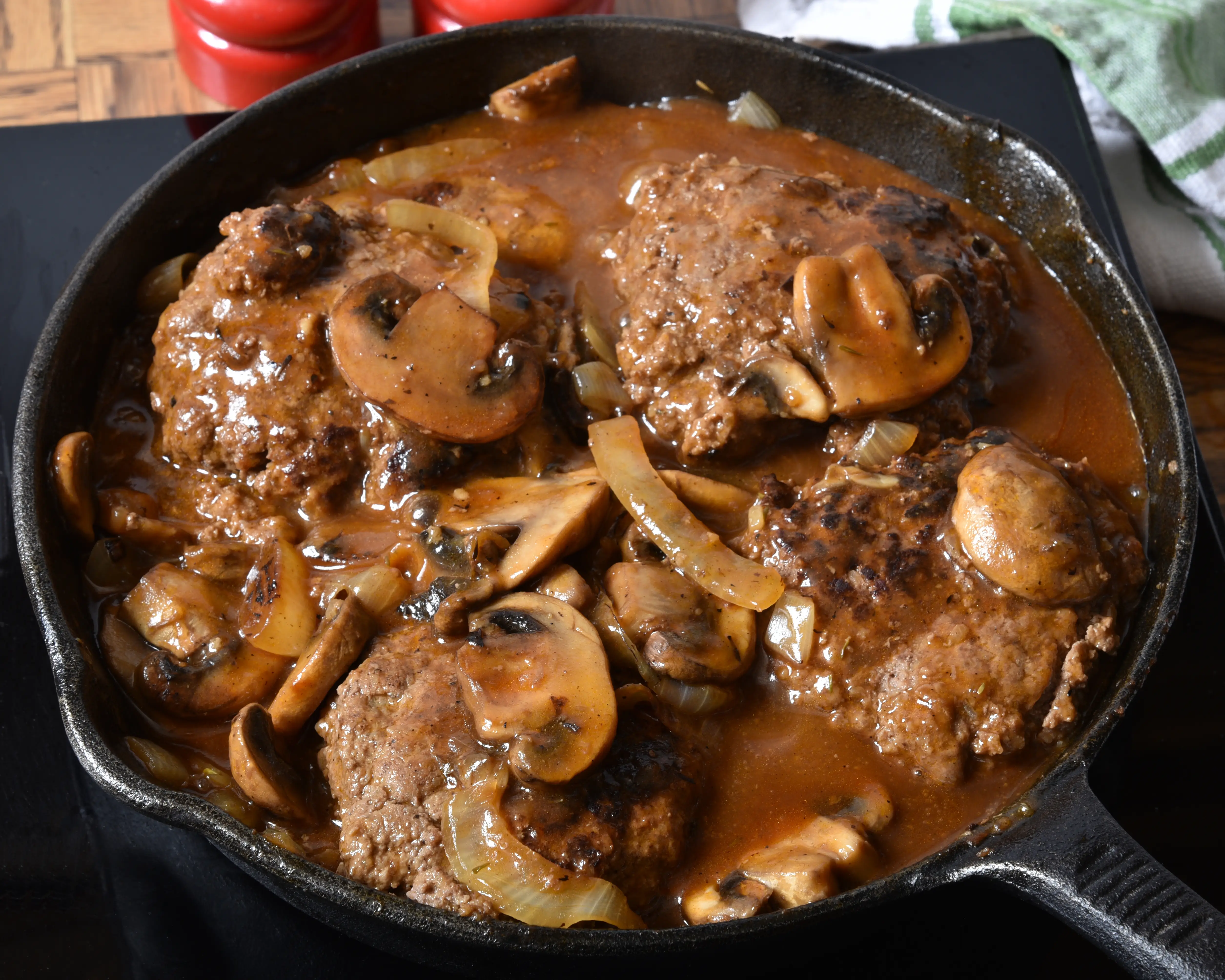 a pan of meatballs and mushrooms