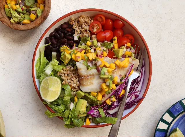 a bowl of food with a fork
