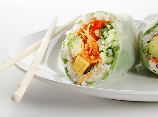 a plate of food on a white surface