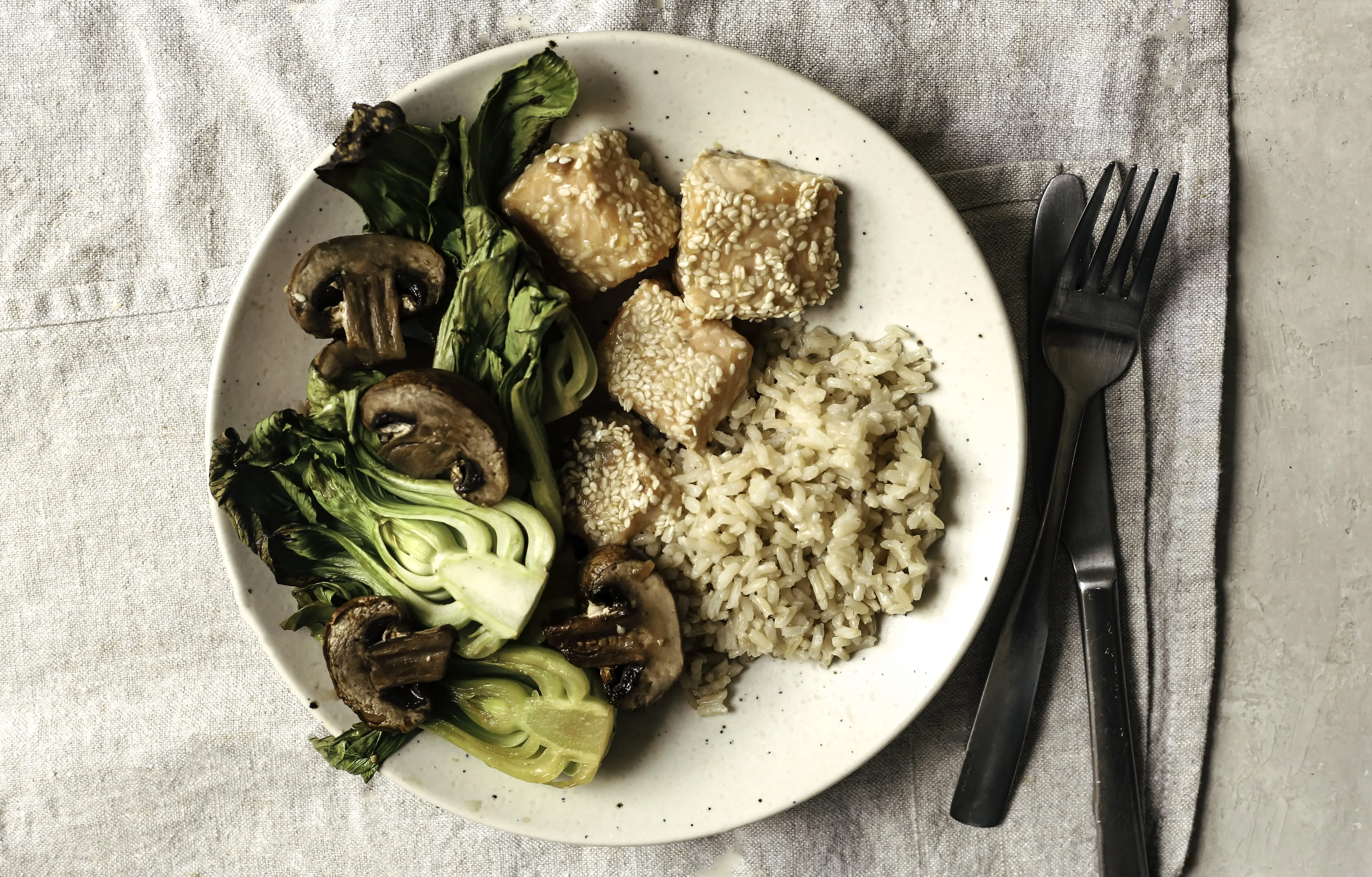 a plate of food with a fork and knife