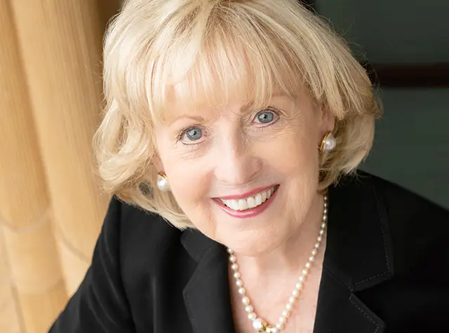 a woman smiling at camera