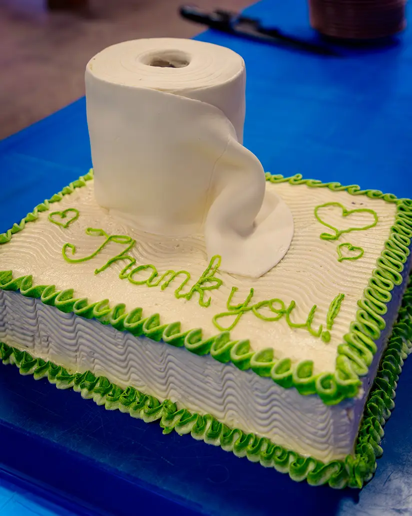 a cake with a roll of toilet paper on it