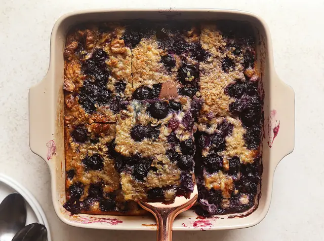 a blueberry oatmeal in a white dish