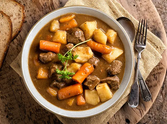 a bowl of stew with meat and vegetables