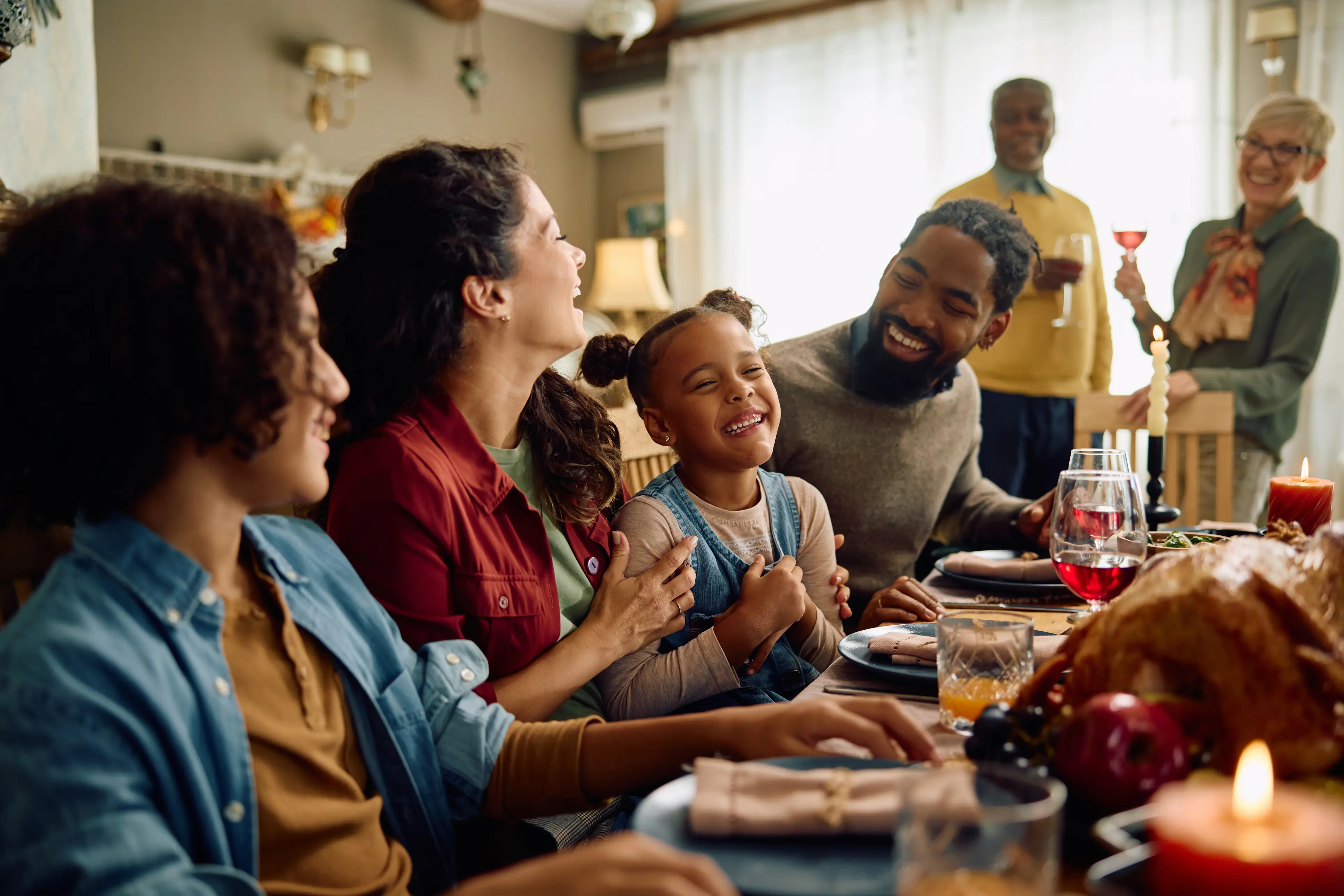 a group of people sitting at a table